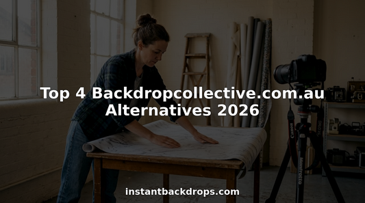 Photographer arranging vinyl backdrop in busy studio